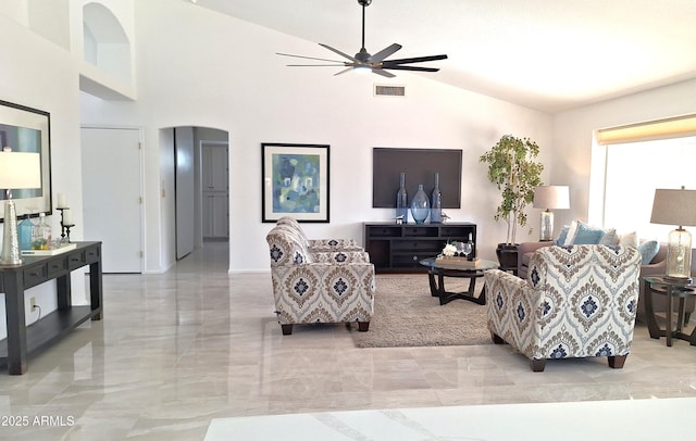 living room with vaulted ceiling and ceiling fan