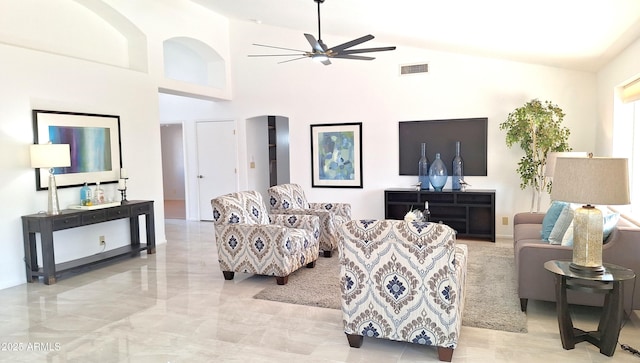 living room with vaulted ceiling and ceiling fan