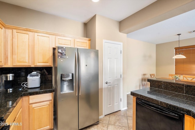 kitchen featuring black dishwasher, stainless steel fridge with ice dispenser, tile countertops, light brown cabinets, and backsplash