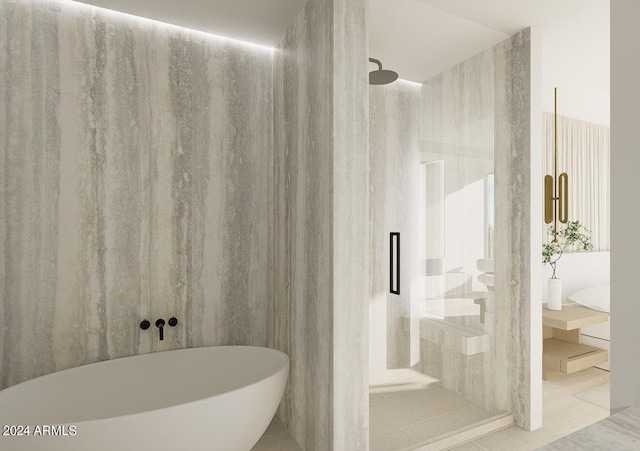 bathroom featuring tile patterned floors and shower with separate bathtub