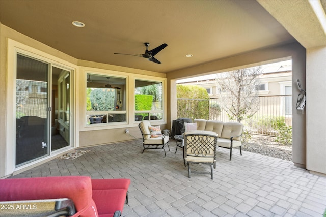 exterior space with a ceiling fan