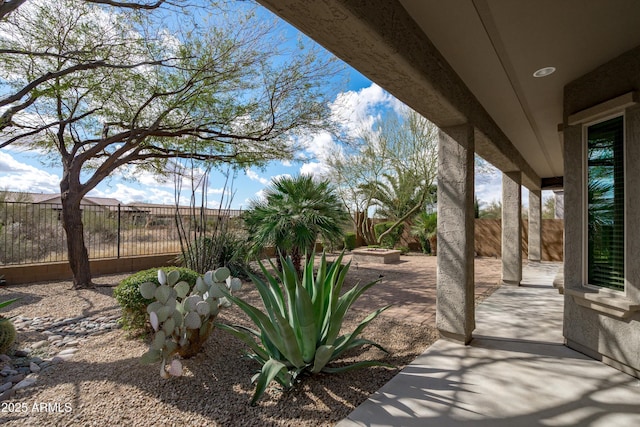 view of yard with a fenced backyard and a patio