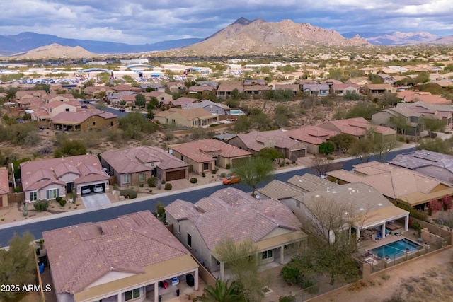 aerial view featuring a residential view and a mountain view