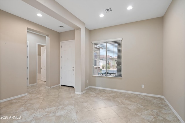 unfurnished bedroom featuring baseboards, visible vents, and recessed lighting