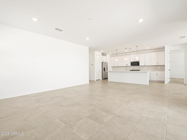 4032 S 176th Dr, Goodyear, AZ 85338 - unfurnished living room with recessed lighting