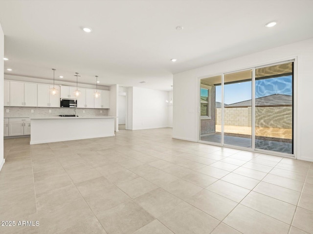 4032 S 176th Dr, Goodyear, AZ 85338 - unfurnished living room featuring recessed lighting and light tile patterned floors