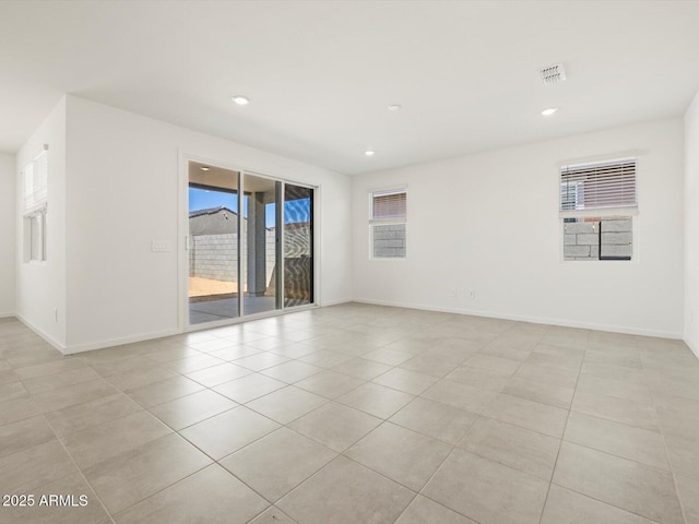 4032 S 176th Dr, Goodyear, AZ 85338 - spare room featuring light tile patterned flooring and recessed lighting