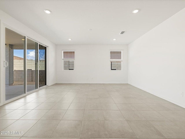 4032 S 176th Dr, Goodyear, AZ 85338 - spare room featuring recessed lighting and light tile patterned flooring