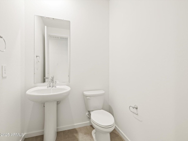 4032 S 176th Dr, Goodyear, AZ 85338 - half bathroom featuring toilet and tile patterned floors