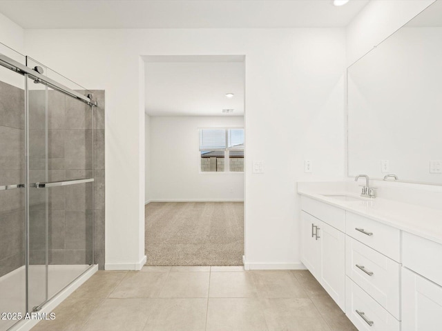 4032 S 176th Dr, Goodyear, AZ 85338 - full bath featuring a shower stall, vanity, tile patterned flooring, and recessed lighting