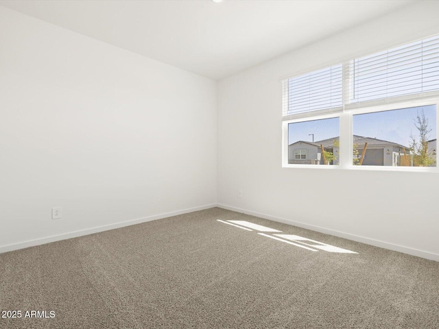 4032 S 176th Dr, Goodyear, AZ 85338 - carpeted spare room featuring baseboards