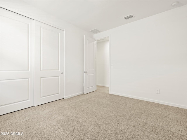 4032 S 176th Dr, Goodyear, AZ 85338 - unfurnished bedroom featuring light carpet and a closet