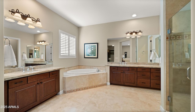 17755 E Colt Dr, Queen Creek, AZ 85142 - bathroom with two vanities, a shower stall, a garden tub, and a sink