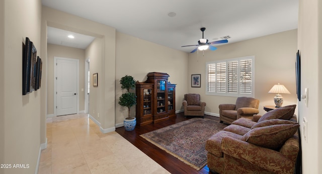 17755 E Colt Dr, Queen Creek, AZ 85142 - living area featuring wood finished floors, visible vents, baseboards, and ceiling fan