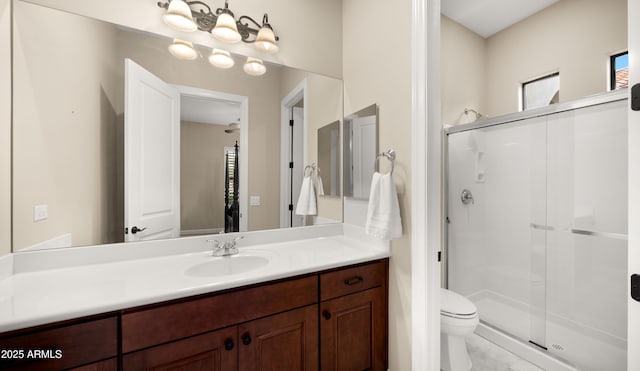 17755 E Colt Dr, Queen Creek, AZ 85142 - bathroom with vanity, toilet, and a shower stall