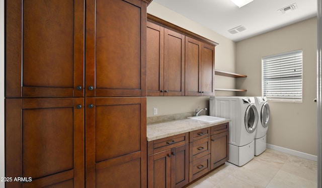 17755 E Colt Dr, Queen Creek, AZ 85142 - laundry room featuring visible vents, a sink, cabinet space, baseboards, and washing machine and clothes dryer