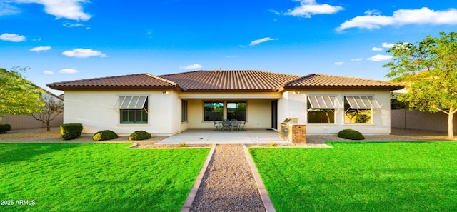 17755 E Colt Dr, Queen Creek, AZ 85142 - back of property featuring a patio area, a lawn, a tiled roof, and fence