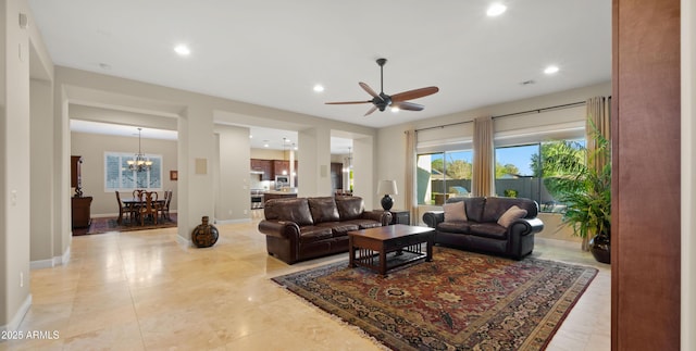 17755 E Colt Dr, Queen Creek, AZ 85142 - living room featuring recessed lighting, ceiling fan with notable chandelier, and baseboards