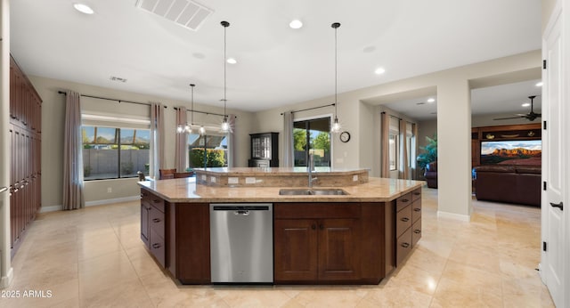 17755 E Colt Dr, Queen Creek, AZ 85142 - kitchen featuring visible vents, a healthy amount of sunlight, a center island with sink, dishwasher, and a sink