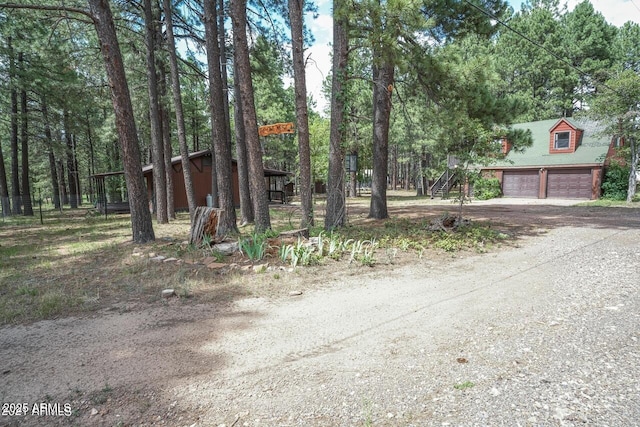 exterior space with a garage