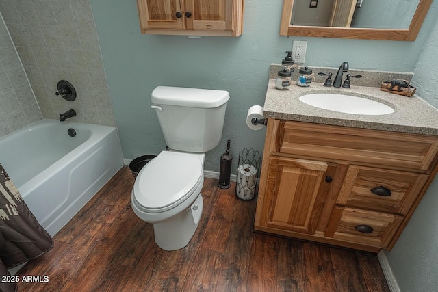 1449 Elk Dr, Forest Lakes, AZ 85931 - full bathroom featuring vanity, tiled shower / bath, hardwood / wood-style flooring, and toilet