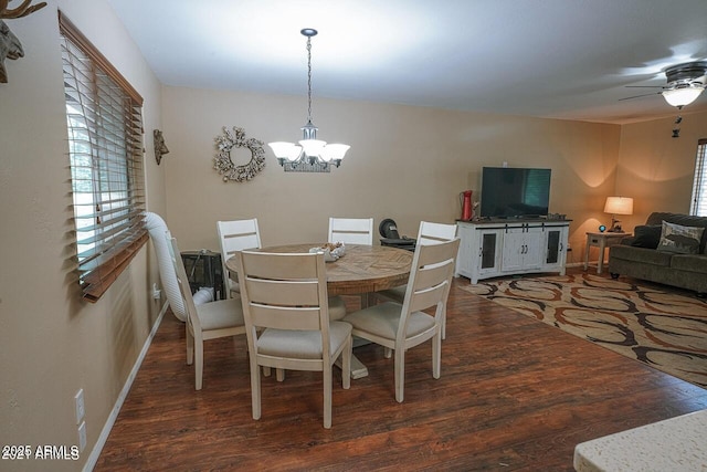 1449 Elk Dr, Forest Lakes, AZ 85931 - dining area with ceiling fan with notable chandelier and dark hardwood / wood-style floors