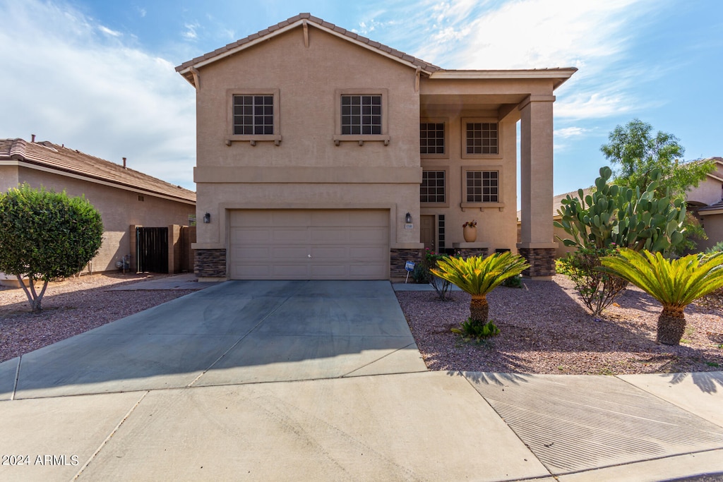 view of front of house with a garage