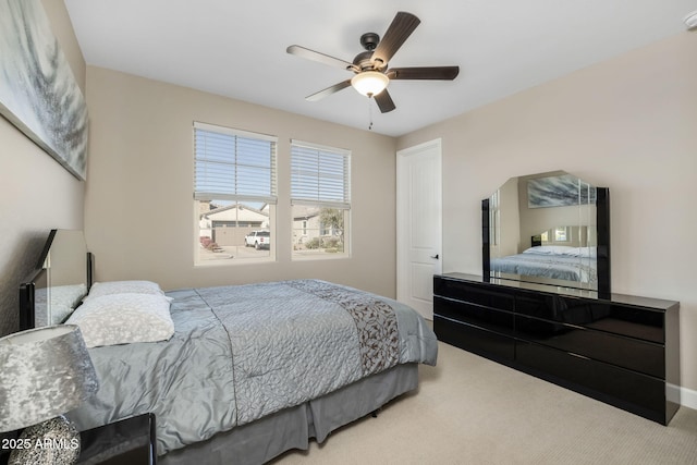 bedroom with carpet flooring and ceiling fan