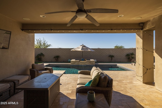 view of patio / terrace with ceiling fan, an outdoor hangout area, and a fenced in pool