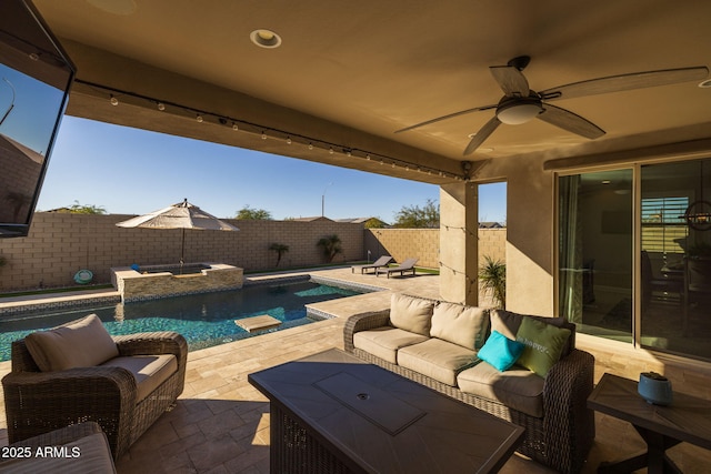 view of patio / terrace featuring ceiling fan, an outdoor hangout area, and a fenced in pool