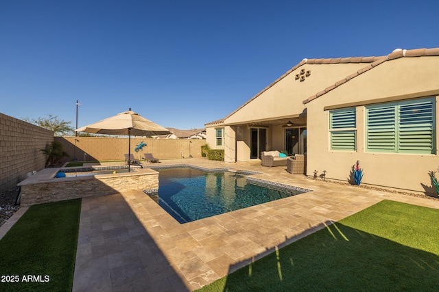 view of swimming pool with a patio area