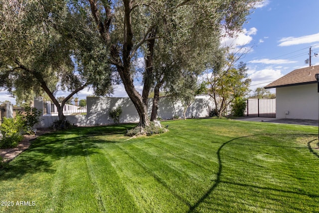 view of yard featuring fence