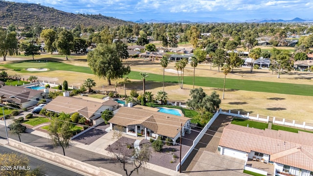 bird's eye view featuring golf course view, a residential view, and a mountain view