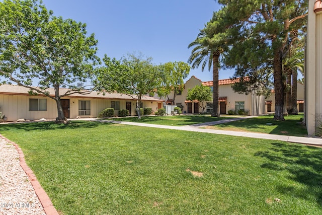 view of front of home with a front yard