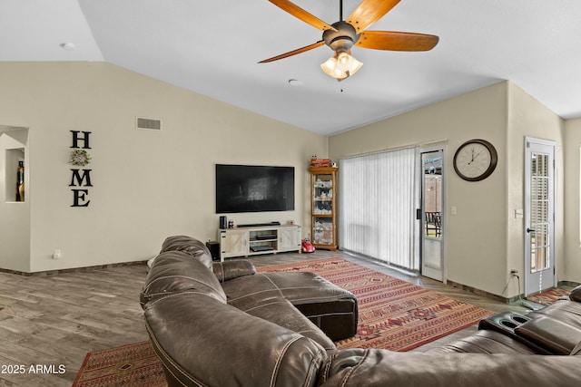 living room with vaulted ceiling, hardwood / wood-style floors, and ceiling fan