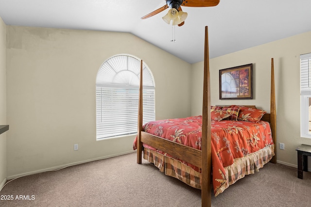 bedroom with vaulted ceiling, carpet, and ceiling fan