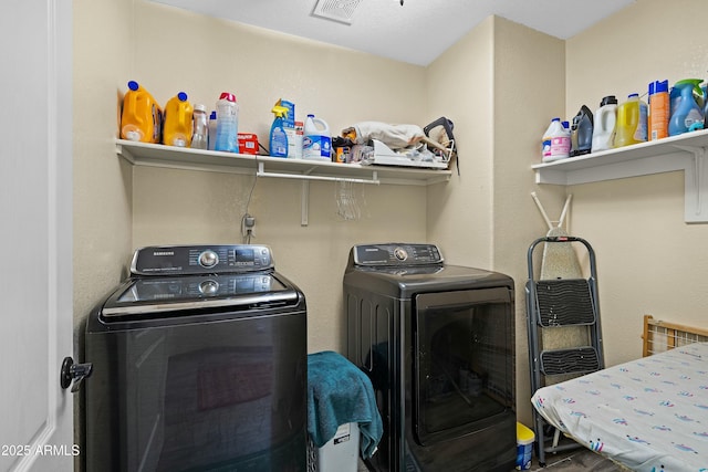 laundry area featuring washing machine and dryer