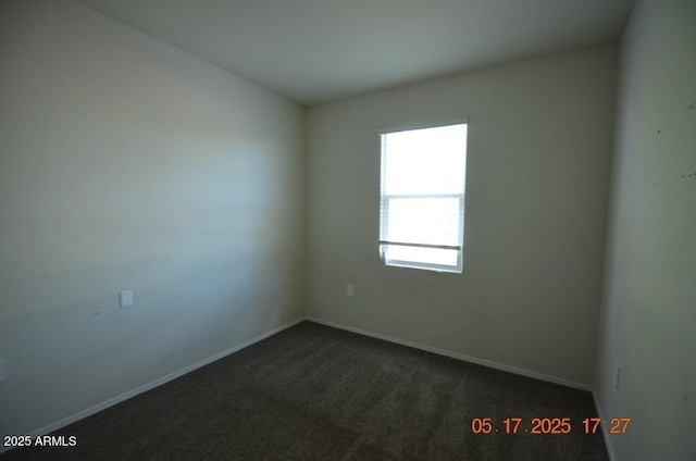 24646 N Barley Rd, Florence, AZ 85132 - unfurnished room with dark carpet and baseboards