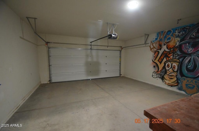 24646 N Barley Rd, Florence, AZ 85132 - garage with a garage door opener and baseboards
