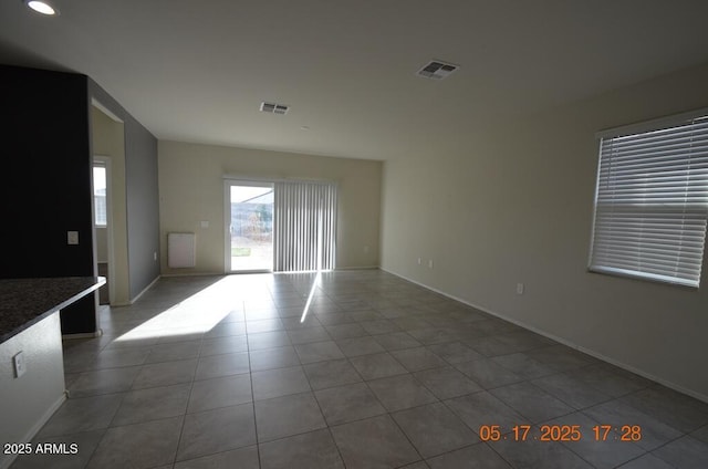 24646 N Barley Rd, Florence, AZ 85132 - empty room featuring tile patterned floors, baseboards, and recessed lighting