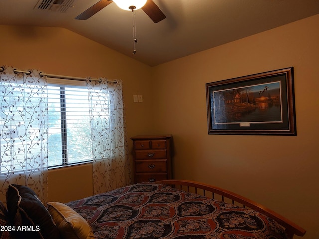 bedroom featuring vaulted ceiling and ceiling fan