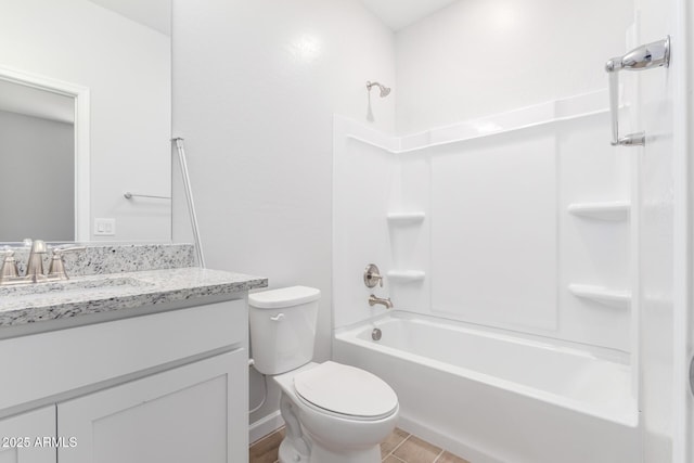 full bathroom with vanity,  shower combination, toilet, and tile patterned flooring