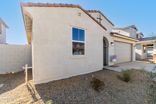 exterior space featuring a garage