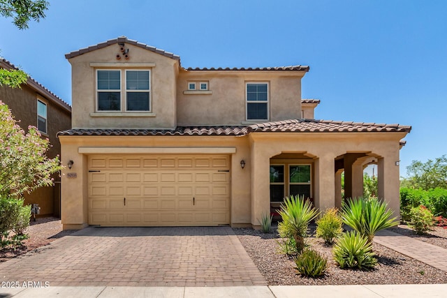 5016 S Curie Way, Mesa, AZ 85212 - view of front of property with a garage, stucco siding, a tiled roof, and decorative driveway