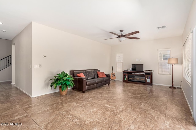 5016 S Curie Way, Mesa, AZ 85212 - living room with a ceiling fan and stairway