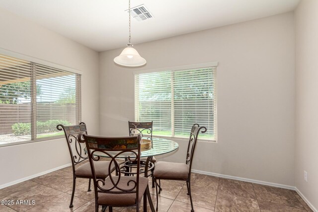 5016 S Curie Way, Mesa, AZ 85212 - dining area featuring baseboards