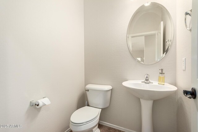 5016 S Curie Way, Mesa, AZ 85212 - bathroom featuring toilet and baseboards