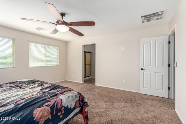 5016 S Curie Way, Mesa, AZ 85212 - bedroom featuring carpet floors, multiple windows, and ceiling fan