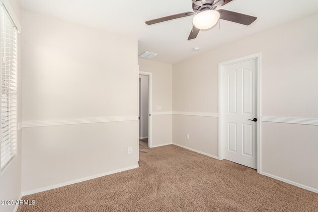5016 S Curie Way, Mesa, AZ 85212 - unfurnished bedroom featuring carpet flooring and ceiling fan