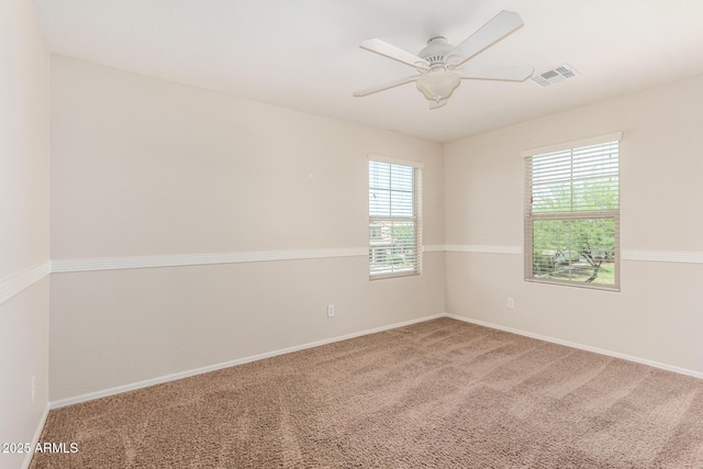 5016 S Curie Way, Mesa, AZ 85212 - empty room with a ceiling fan and carpet floors